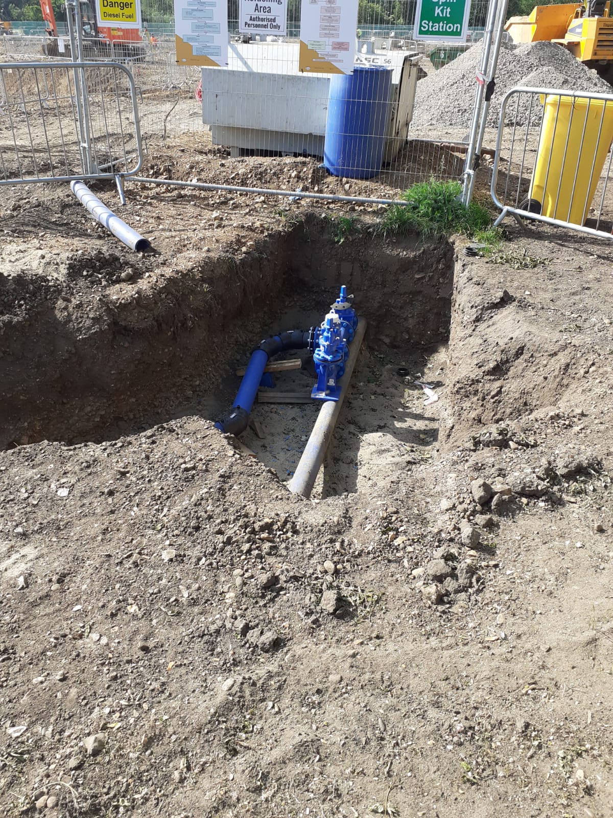 Grange Paddocks (water main diversion) ground dug up revealing water pipe