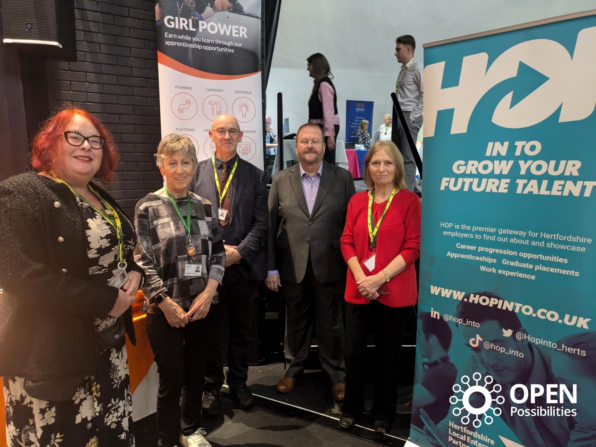 Councillors at the 2024 Generation Careers Fair, standing with a promotional banner