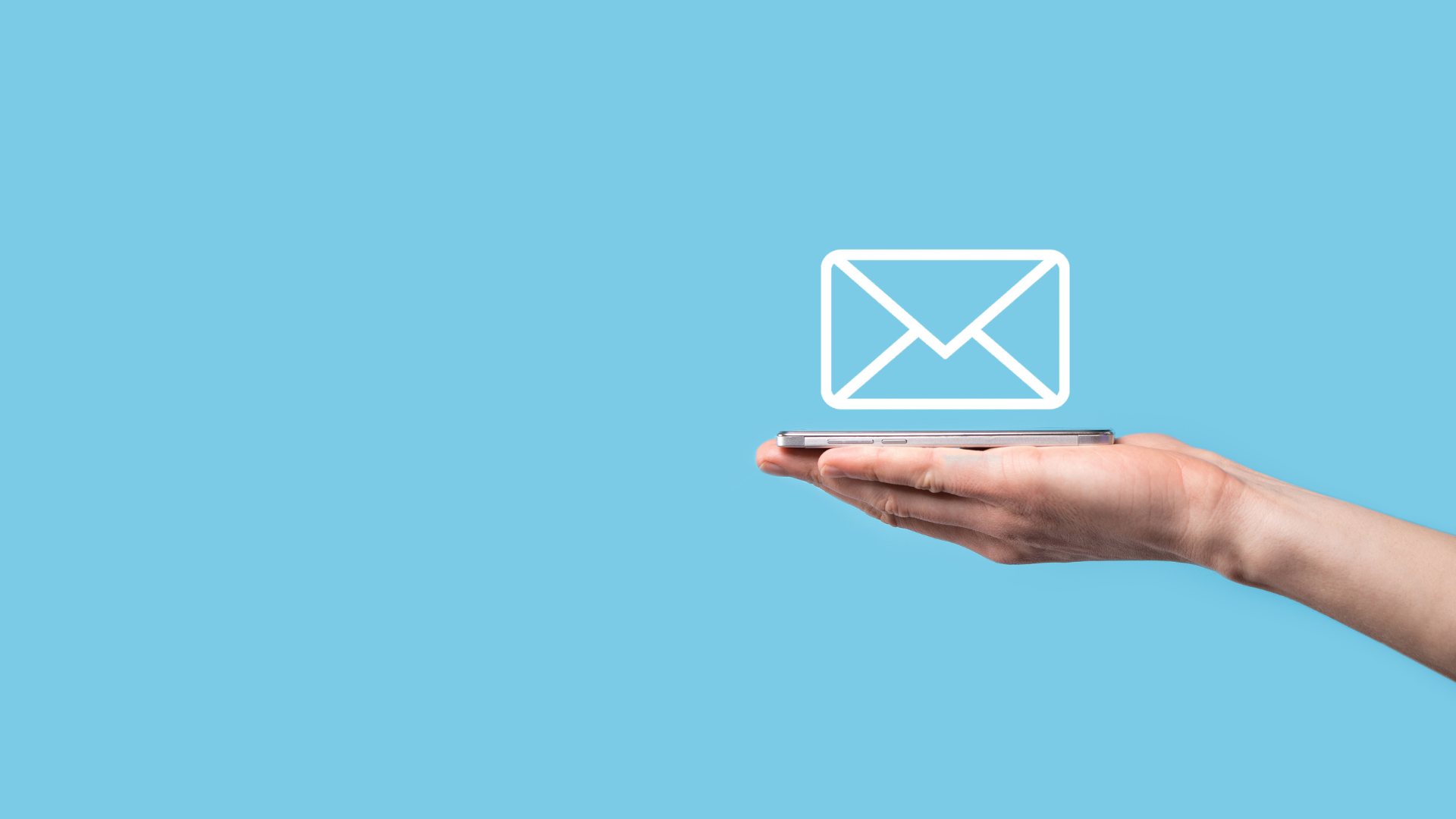 on a blue background, a hand holds a phone in it's palm with the outline of a letter hovering above it.