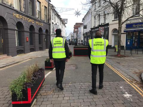 Two Covid marshals patrolling the streets of Hertford