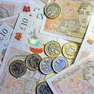 Phone of money - Pile of Ten and one pounds