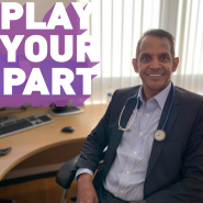 Doctor with "Play your part" slogan in purple and white