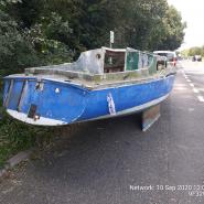 Flytipped boat in Buntingford