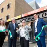 Councillors and partners cutting ribbon outside of new car park