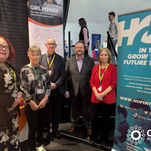 Councillors at the 2024 Generation Careers Fair, standing with a promotional banner